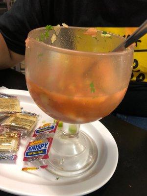 Half eaten shrimp cocktail