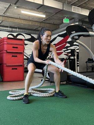 Functional athletic  training: rope pull.  Full body workout