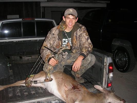 A local young-man's first deer with a bow.