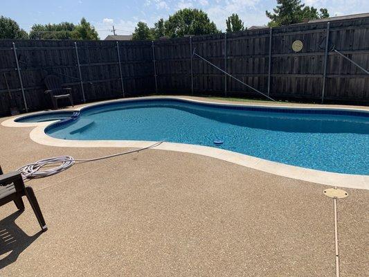 Travertine with pebble finish.