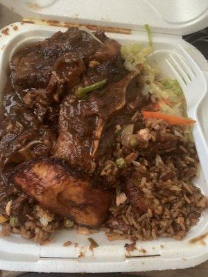 Oxtails, Salmon fried rice, steamed cabbage and plantains