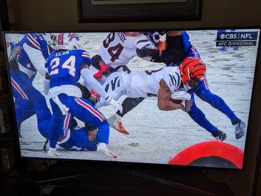 Joe Mixon dives with the ball. Cincinnati Bengals at Buffalo Bills. NFL Playoffs AFC Divisional. Sunday, January 22, 2023. NFL on CBS.