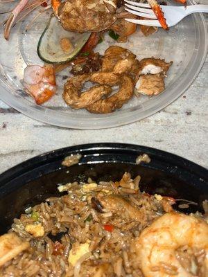 Found several pieces of chicken and a piece of beef in my seafood rice.