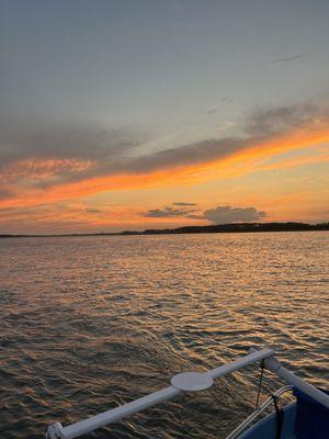 Sunset sailing onboard, private charters aboard Seas Life Sailing charters in Folly Beach. Call today to book your dolphin boat rental sail.