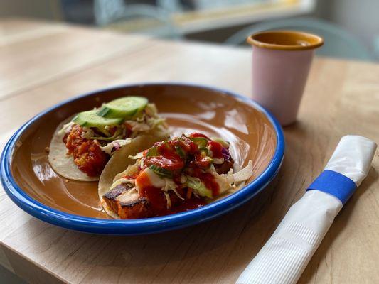 Pork Belly taco and fried chicken taco