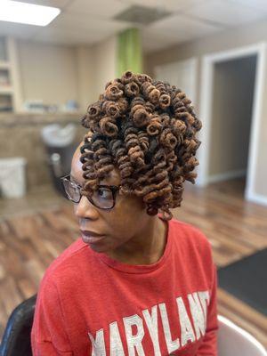 Locs in curly updo