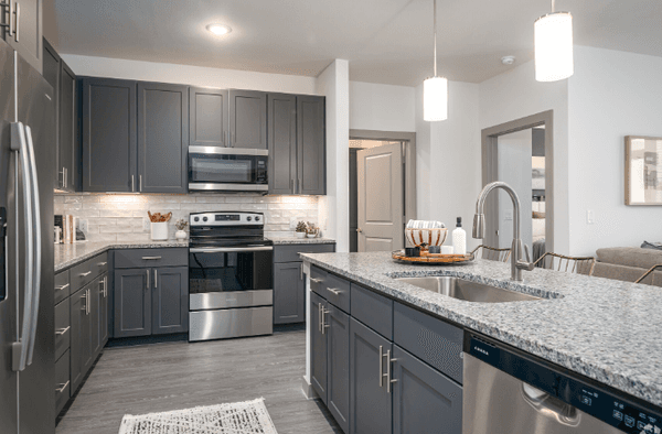 The kitchen in this apartment is beautiful and perfect for me to entertain.