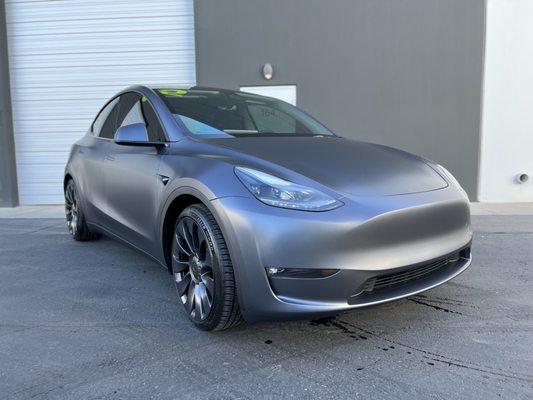 This 2023 Tesla Model Y received our Full Body Stealth Conversion! This is our 8MIL PPF that comes with a 10 Year Warranty!