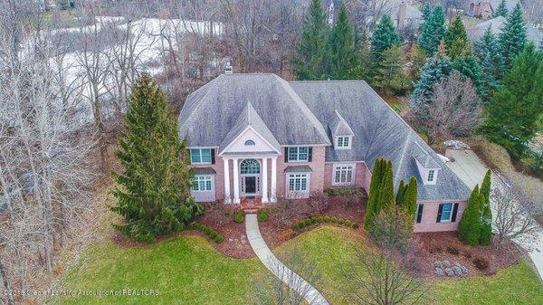 Drone Photos taken on every listing. This beauty is in Okemos