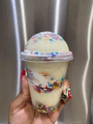 Birthday cake Gelati (Ice layered with Ice cream) cake batter, sprinkles, and vanilla soft serve