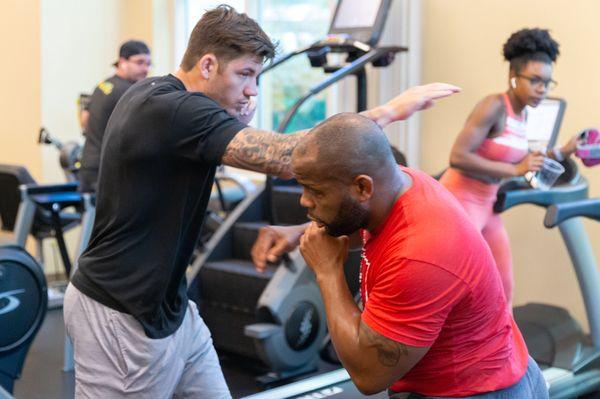 Coach Tony working with UFC world champion Daniel Cormier