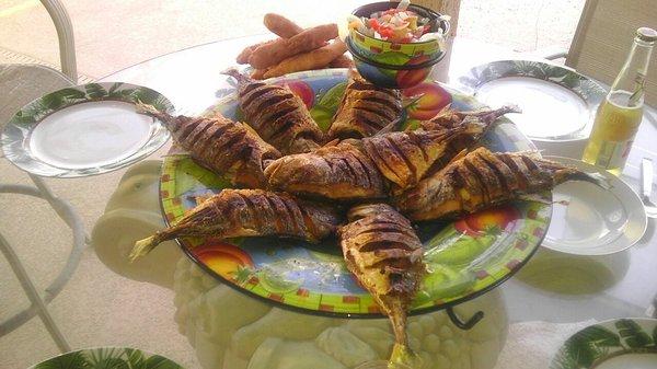 Fried Fish With EScoviche Sauce And Fried Festivals* 
 *Similar to hush Puppies.