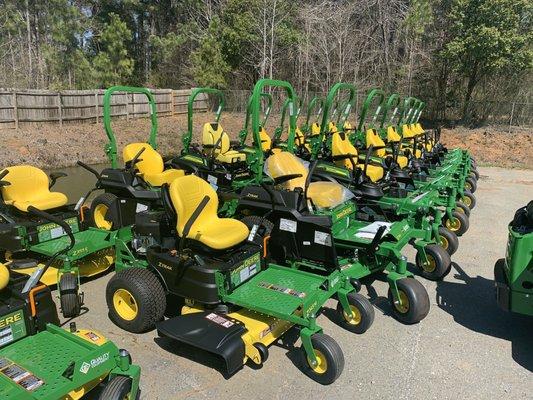 John Deere riding lawnmowers.