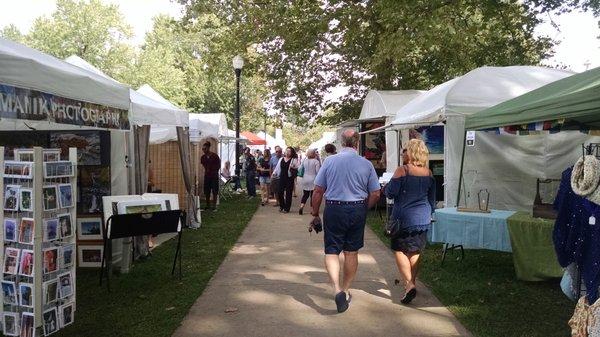 Vendor tents along the walkway.