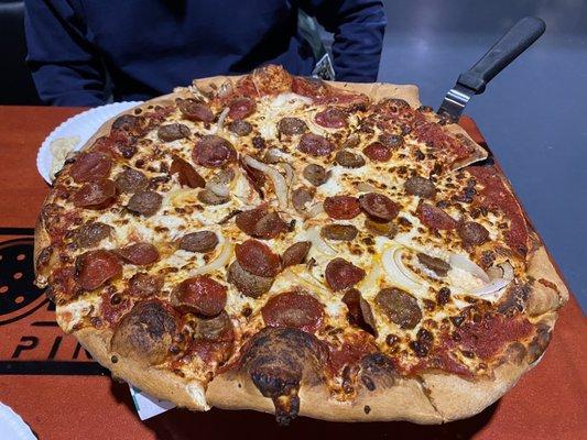 This is the large pepperoni added sausage and onion. Notice the sausage is cut coins from links and not crumbles!