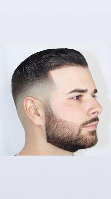 Bald fade, heavy weight towards the top and sharp clean beard