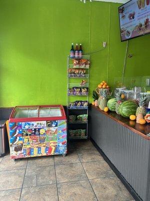 Ice cream & chip section along with the agua Fresca containers