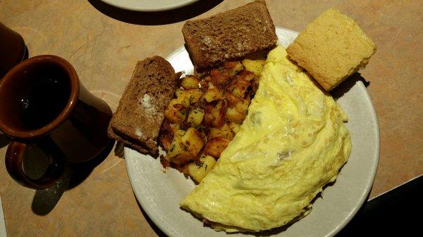 Western omlette,  home fries, wheat toast and 1/2 corn muffin,  w/ coffee. 8 bux and delicious!