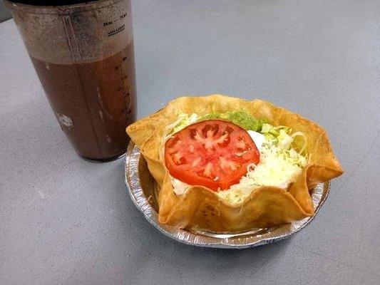 Taco salad with beef and my chocolate shake from home.