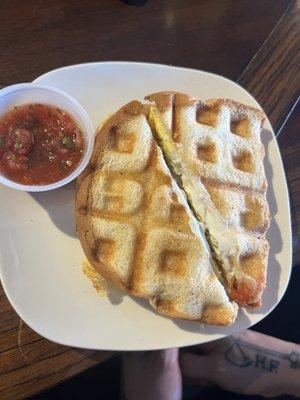 Delicious breakfast sandwich pressed in a waffle iron - YES!