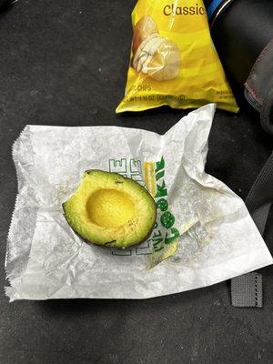 Half an avocado...not on the sandwich and nothing to cut it with?!?