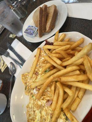 Western Omelette with fries and whole wheat toast