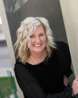 Kelli Grant, CLHMS, ILHM, RSPS, Realtor, e-PRO