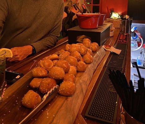 The pretzels are served at the bar with melted cheese.  Yummy.