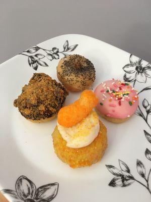 From front clockwise, junk food (cheeto cream cheese) the bart (butterfinger), irene (lemon poppyseed), the homer (pineapple hibiscus)