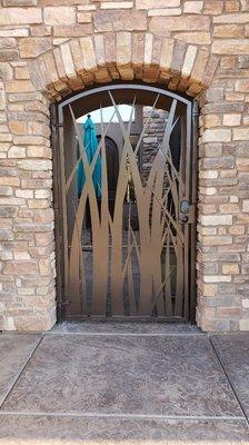 Plasma cut courtyard gate