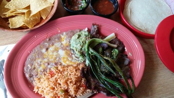 Carne Asada dinner.  Meat was good, although it could have used a bit more seasoning; I really enjoyed the beans and rice!