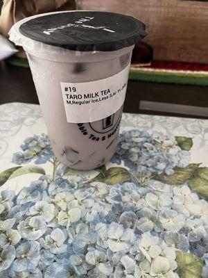 -Taro Milk Tea, with a regular amount of ice, and less sugar.