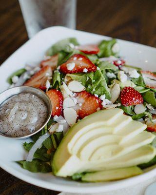 Summertime, strawberry salad with homemade poppyseed dressing