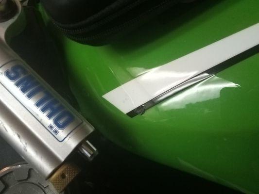 ZX-6R tank cover damage from work completed.