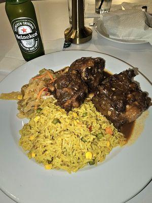 Jamaican Oxtail Full Nigerian Fried Rice Full and Cabbage