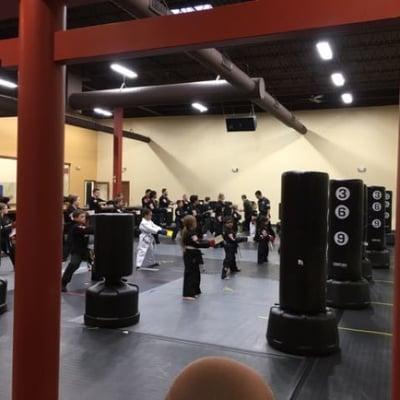 Instructors collecting attendance cards for a nice big class tonight. Lots of students training hard & getting ready for thei...