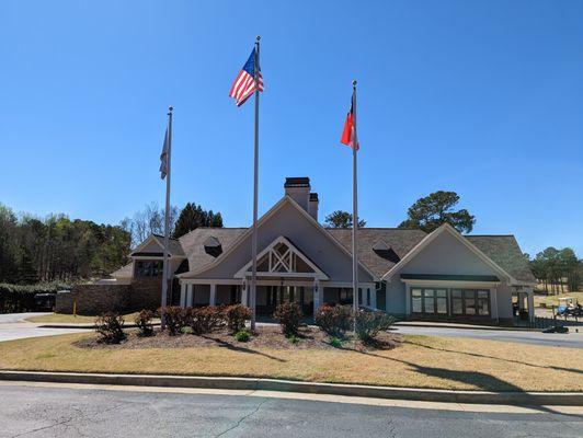 Outside the clubhouse. Storefront. Main entrance. Bag drop.