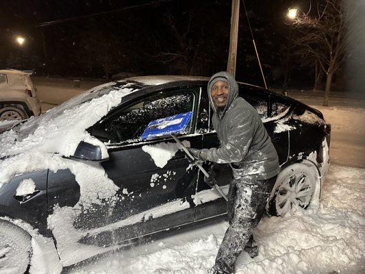 John a.k.a. Batman, cleaning off my car.