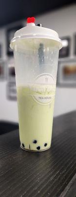 Large pistachio milk tea with boba!