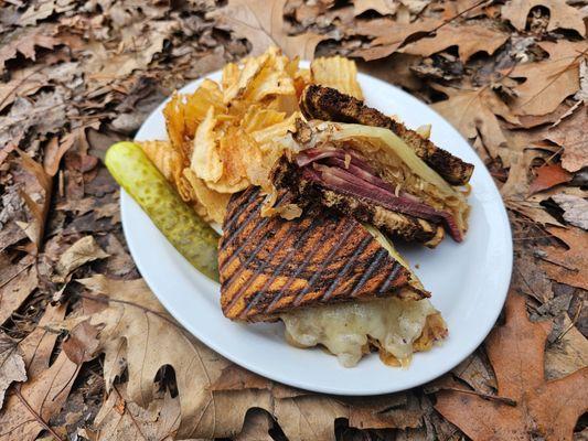 Reuben
 
 "Grilled Rye, House Made Corned Beef Brisket, American Swiss, Kraut, Yooper Island Dressing"