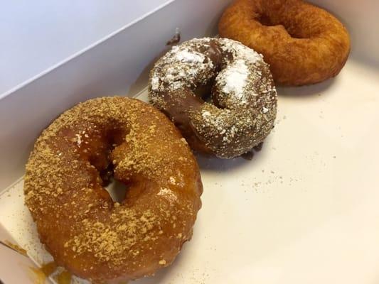 Left to right: peach pie, coffee cake, plain