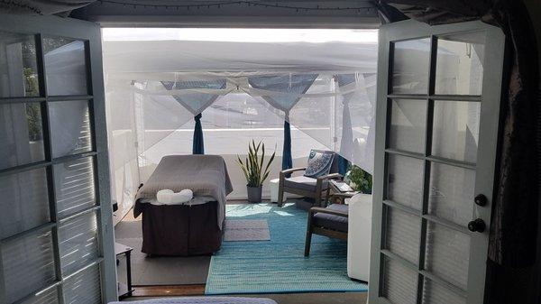 Our cute outdoor canopy / tent for treatments during Covid-19