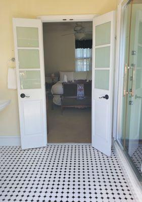 Looking from porch, through spa bathroom into bedroom