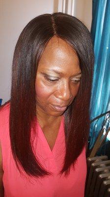 Custom made and colored lace closure wig unit.