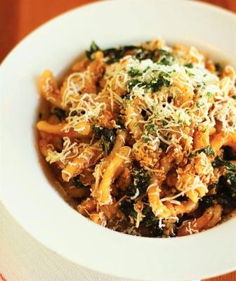 Strozzapretti, hand made pasta with kale and house sausage in a tomato sauce, Sale Pepe Maui.