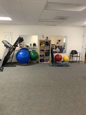 Agile PT's Castro locations has a large open area and multiple treatment beds for patients