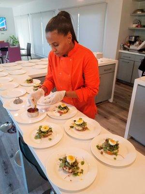 Chef Raquel plating a delicious Lump Crab Salad