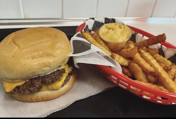 Double cheeseburger with fries and cheese