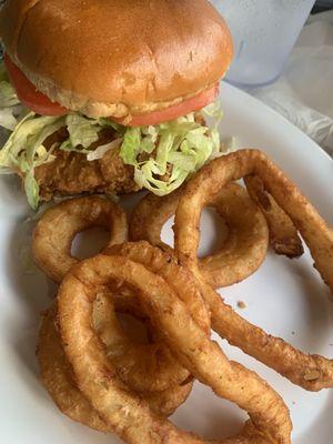 Crispy chicken sandwich with fried onion rings