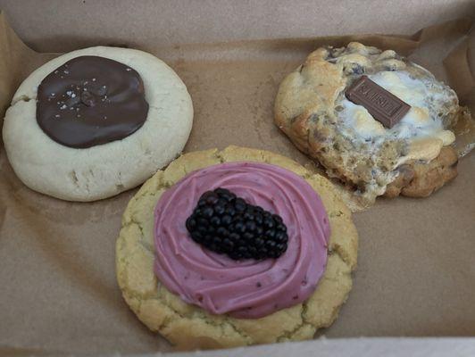 Twix shortbread, S'mores chocolate chip, and lemon with blackberry icing. The lemon cookie was so refreshing!